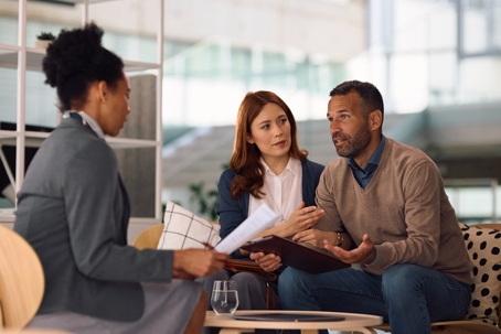 young couple consulting with a professional